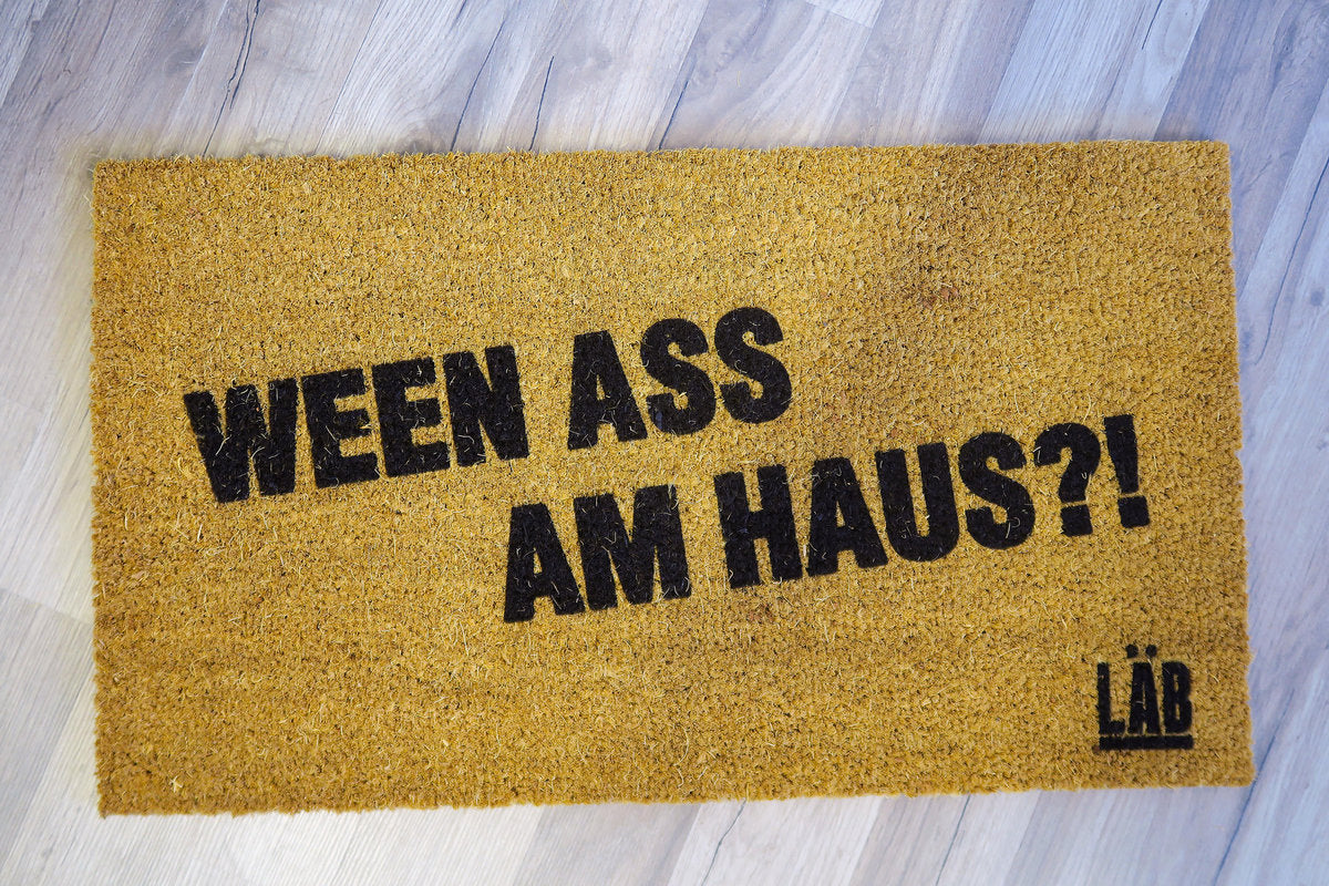 De Läb - Ween ass am Haus?! Teppech / Floormat - Accessory